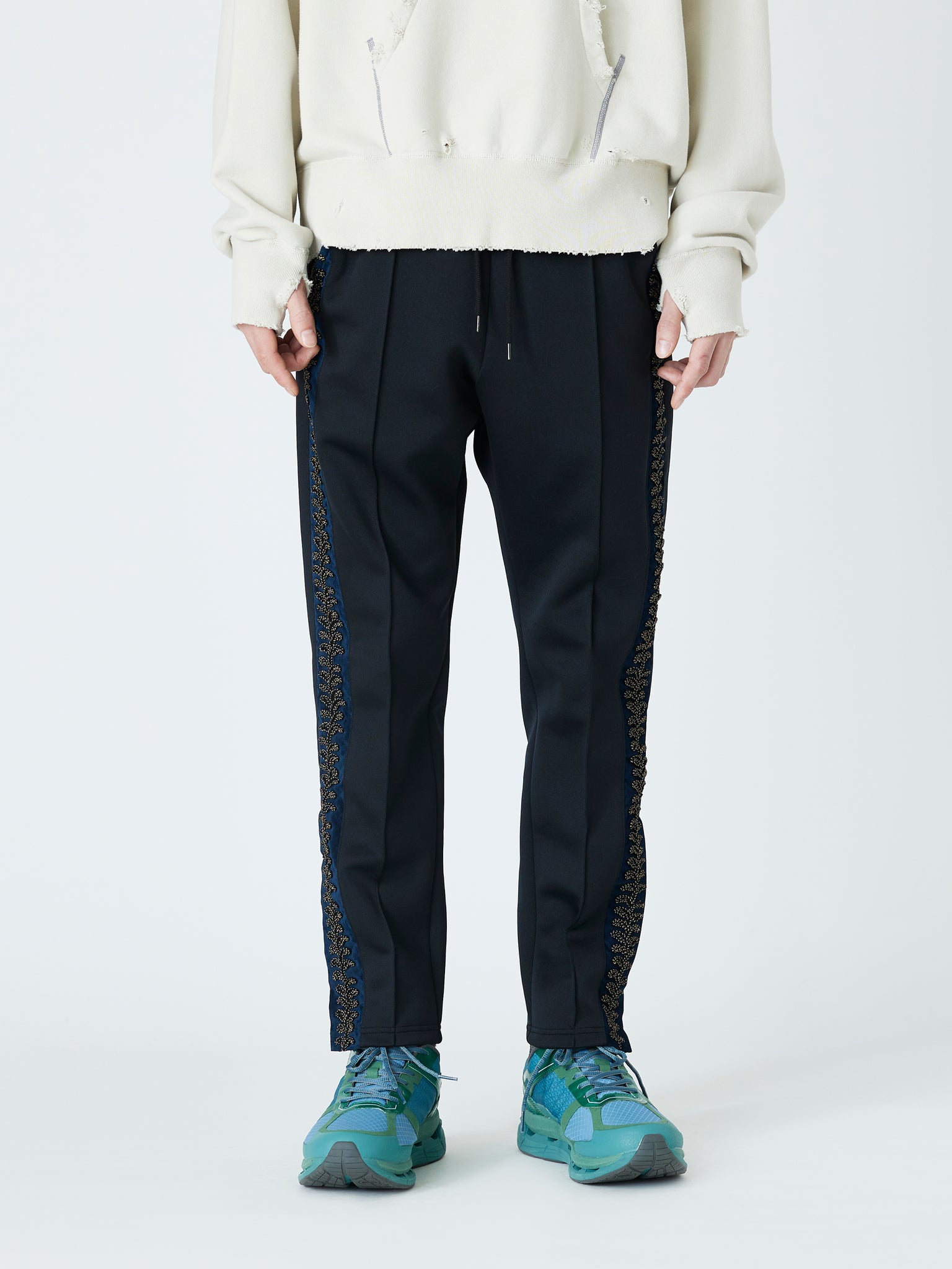 EMBROIDERED TRACK PANTS<br />[BLACK]