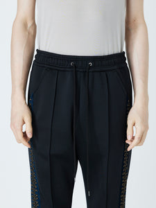 EMBROIDERED TRACK PANTS<br />[BLACK]