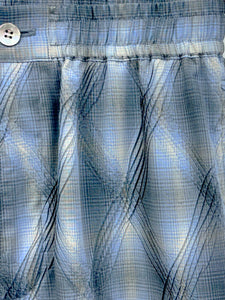 Pants with double pleats<br />[BLUE CHECK]