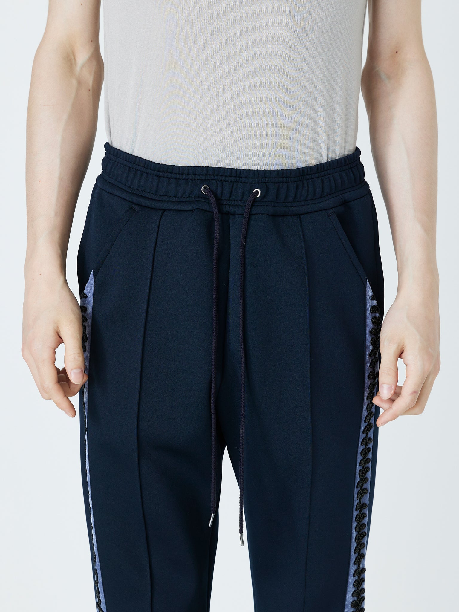 EMBROIDERED TRACK PANTS<br />[NAVY]