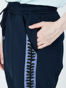 EMBROIDERED TRACK PANTS<br />[NAVY]